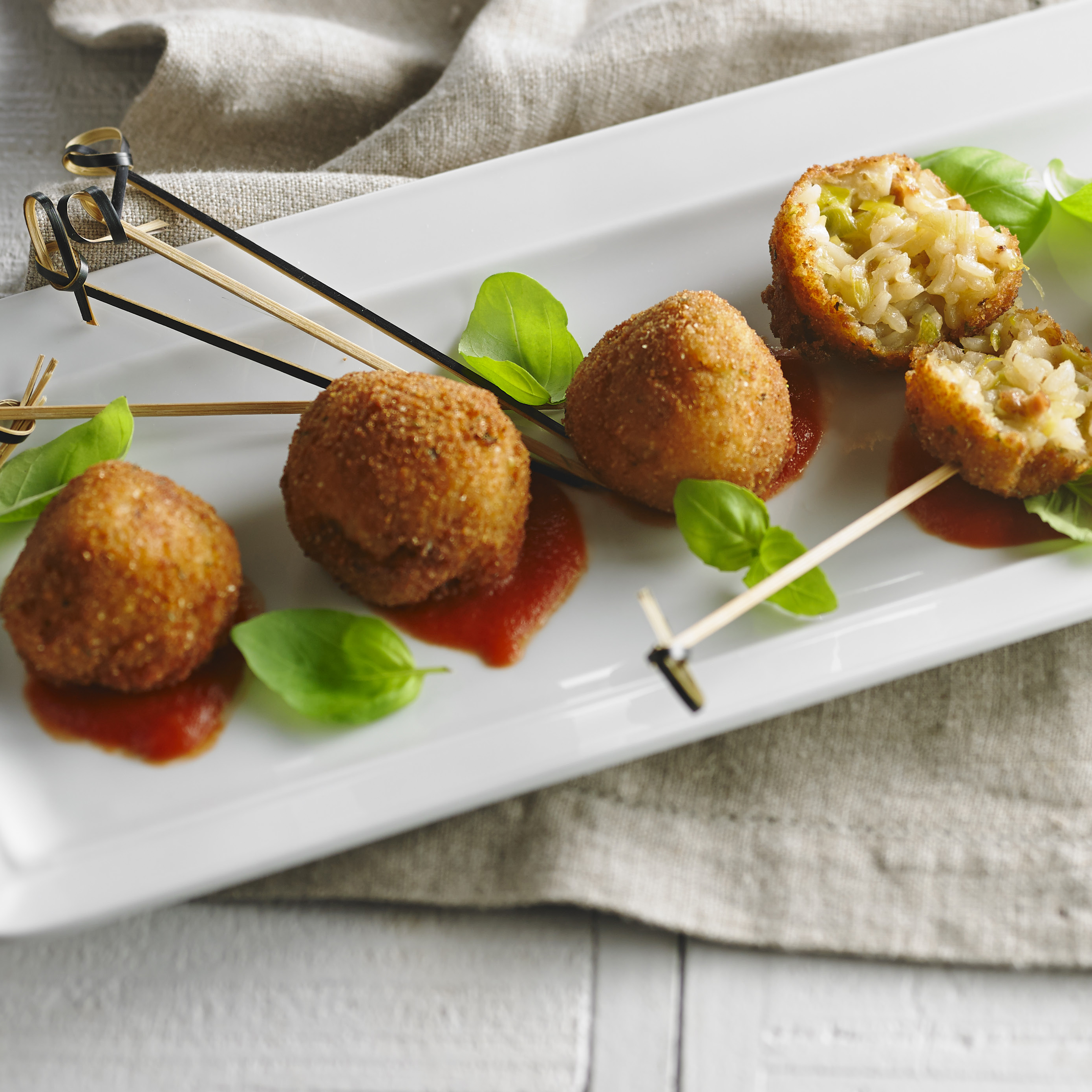 Sausage arancini with leeks | Appetizer recipe