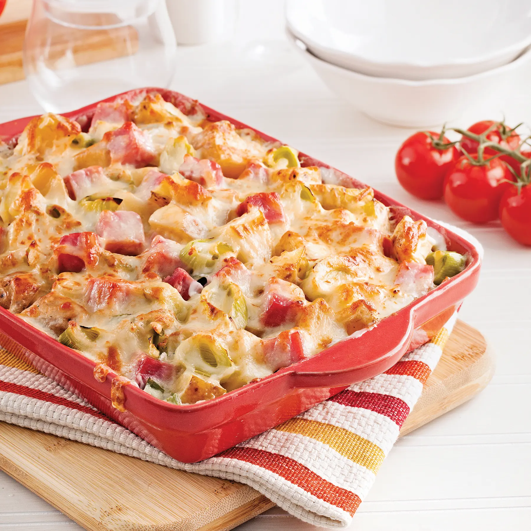 Two potatoes and ham gratin dauphinois